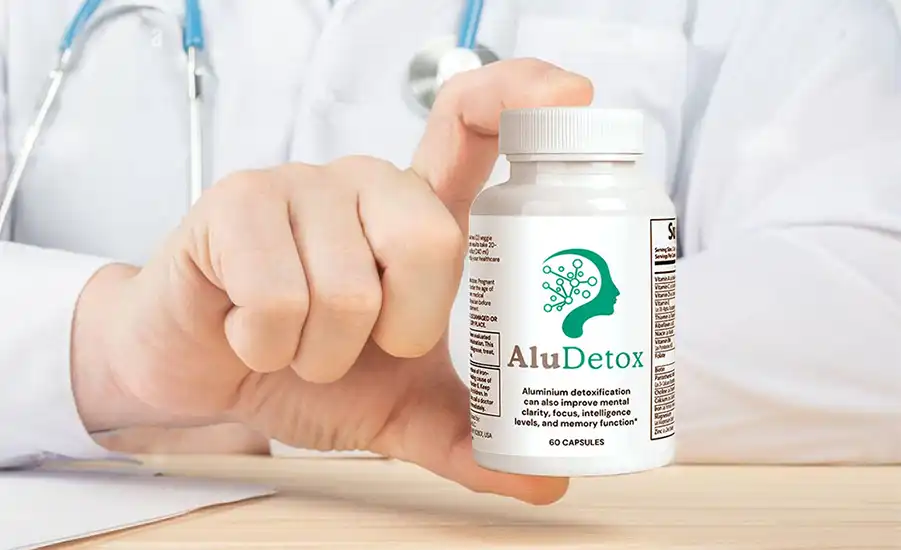 Doctor holding a bottle of AluDetox aluminum detox capsules